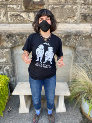 Marissa Paternoster models the t-shirt she designed for Death By Audio